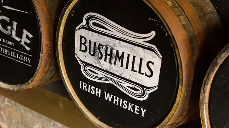 Whiskey barrel with Bushmills logo.