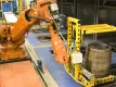 Robotic conveyor system moving barrels