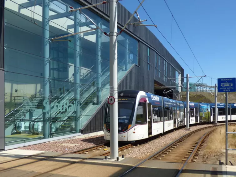 Tram outside station.