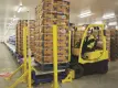 pallet truck moving boxes from conveyor system