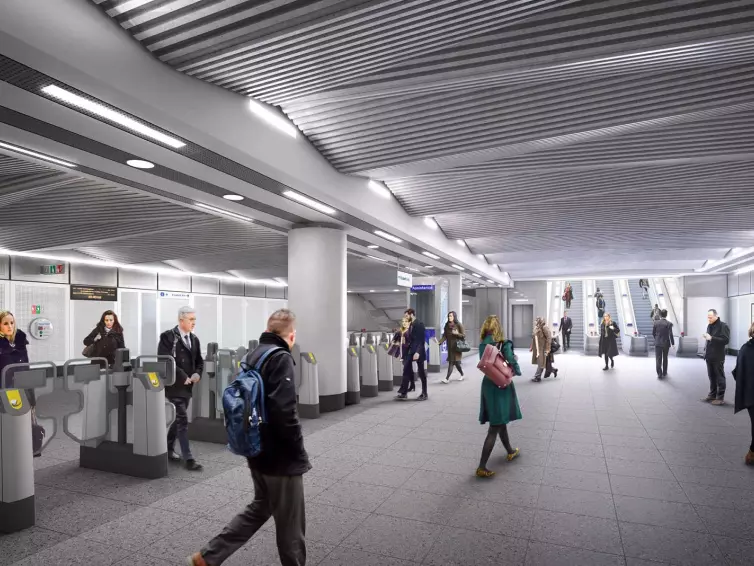 people walking inside Liverpool St railway station.