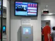 Information screen and ticketing machine in train station