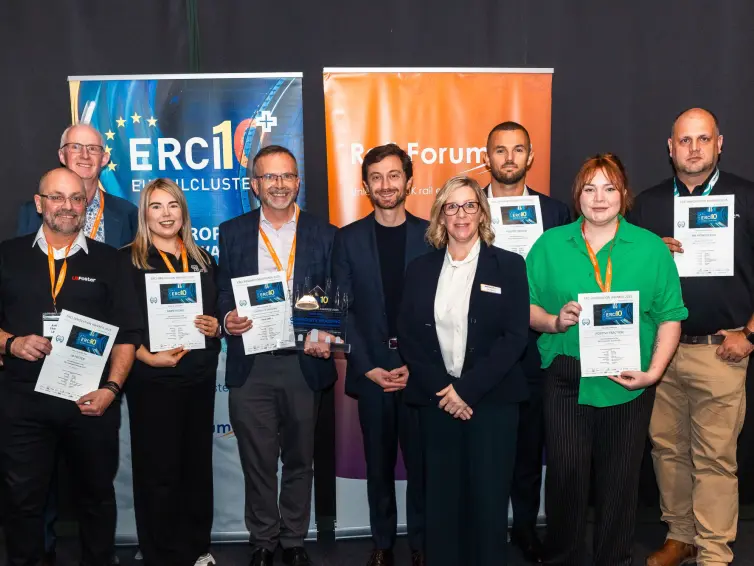 Anthony Thomson stands proudly among the ERCI Innovation Awards winners, joined by Toufic Machnouk, Managing Director of GBRX, celebrating excellence in rail innovation.