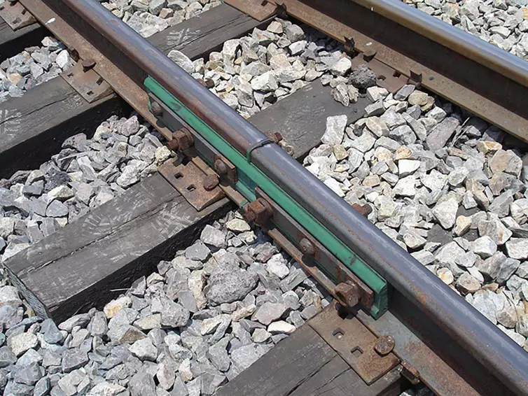 close-up of a insulated rail joint.