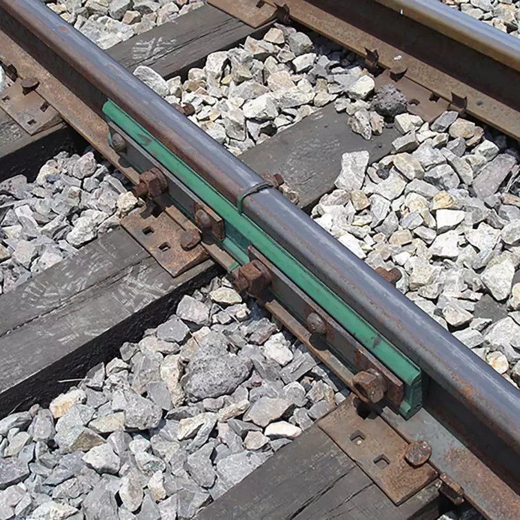 close-up of a insulated rail joint.