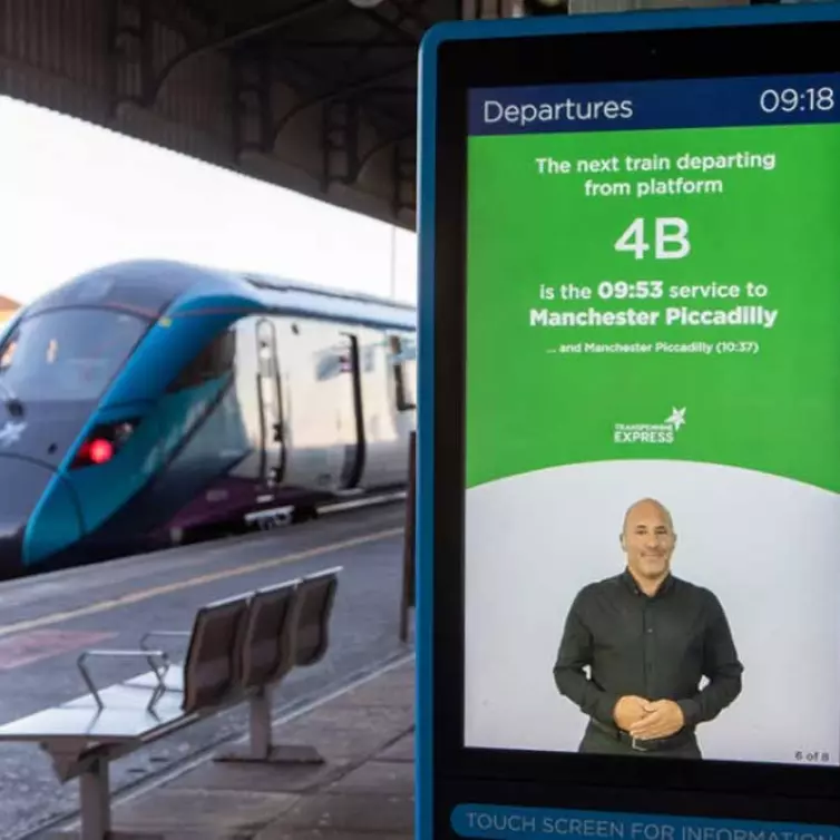 Inform digital totem showing bsl departures for TPE to Manchester.
