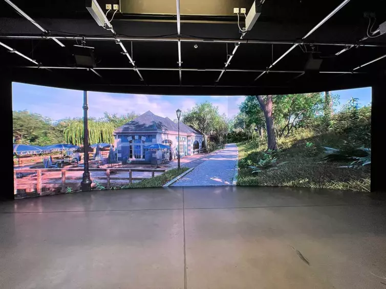 curved wall studio screen showing a cafe.