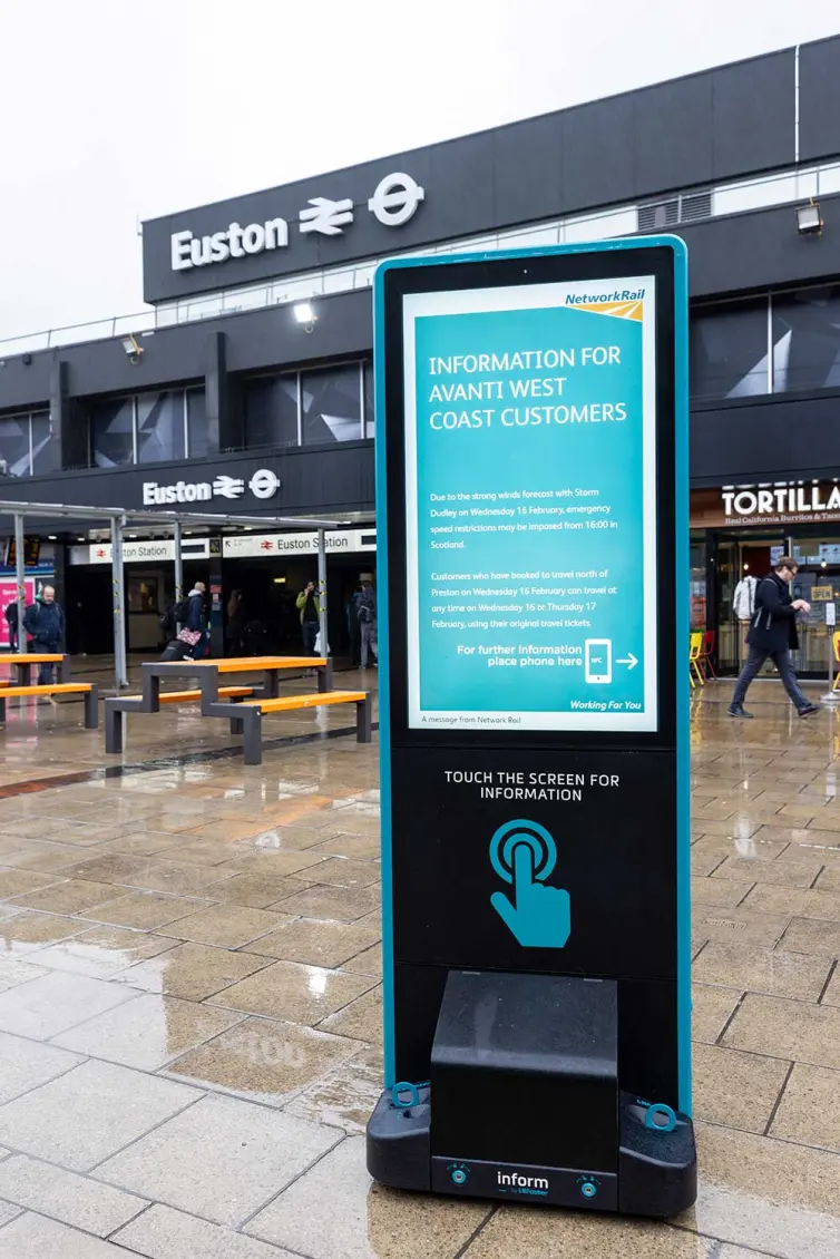 LB Foster information totem outside Euston train station.