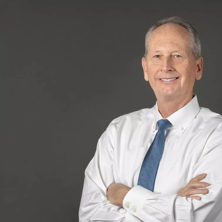 Headshot of Brian Kelly, man smiling.