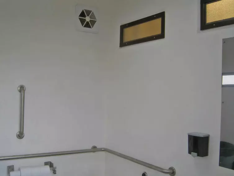 CXT Cortez single-user flush restroom interior.