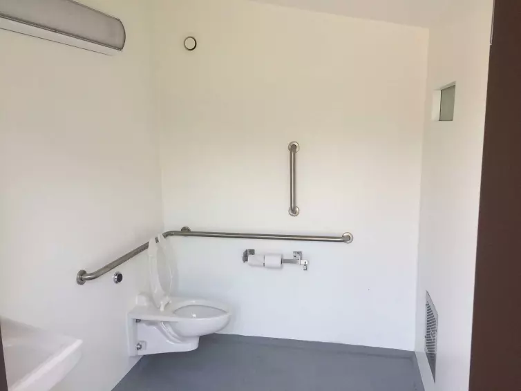 CXT Cortez single-user flush restroom interior.