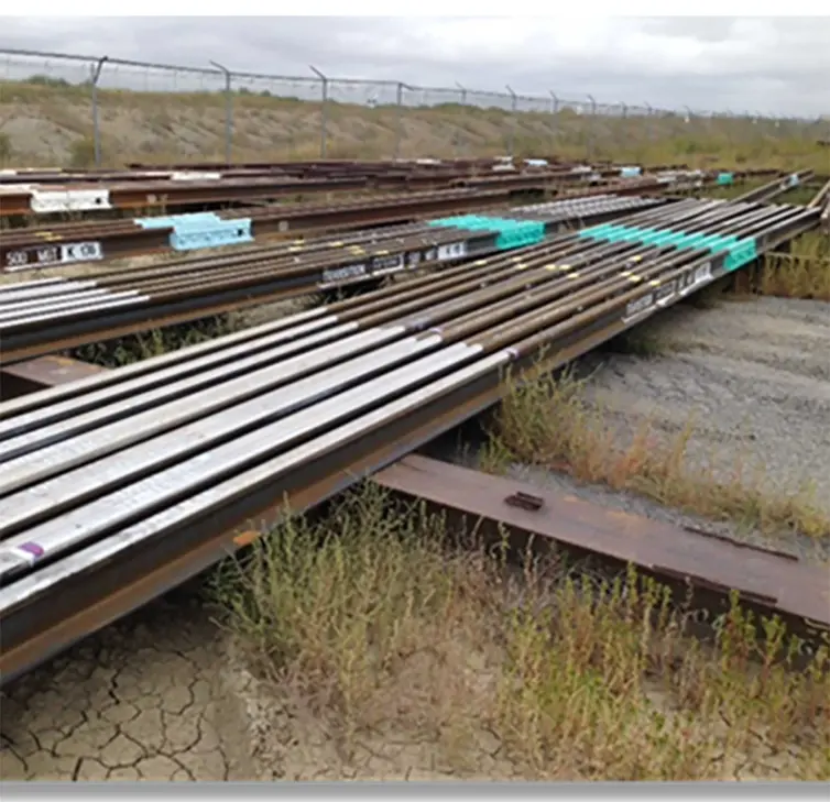 a pile of transition bonded rail.