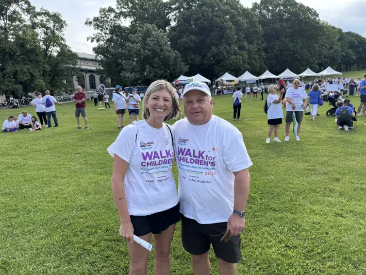 Woman and a man smiling. Sara Rolli, SVP, Operational Admin and John Kasel, President & CEO.